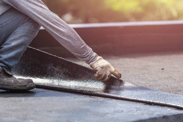 Professional Waterproofing technician working in Lakeville, MN